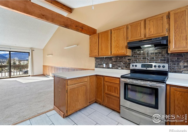 kitchen featuring light carpet, under cabinet range hood, stainless steel range with electric cooktop, a peninsula, and vaulted ceiling with beams