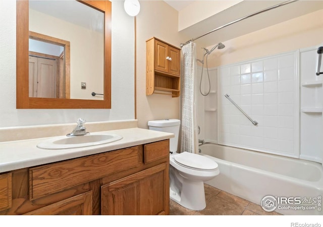 full bathroom featuring tile patterned flooring, shower / tub combo with curtain, toilet, and vanity