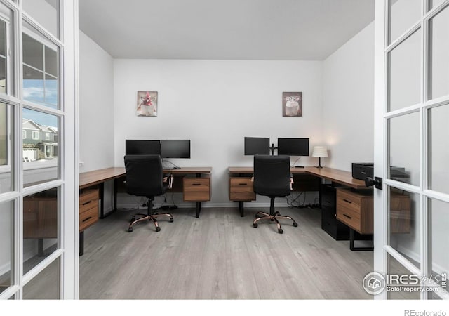 home office featuring light hardwood / wood-style floors