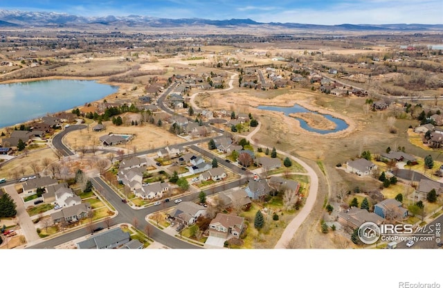 1421 Snipe Ln, Fort Collins, CO 80524 - bird's eye view featuring a residential view and a water and mountain view