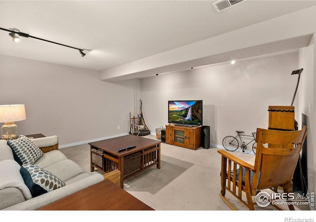 1421 Snipe Ln, Fort Collins, CO 80524 - living area featuring baseboards, track lighting, visible vents, and carpet