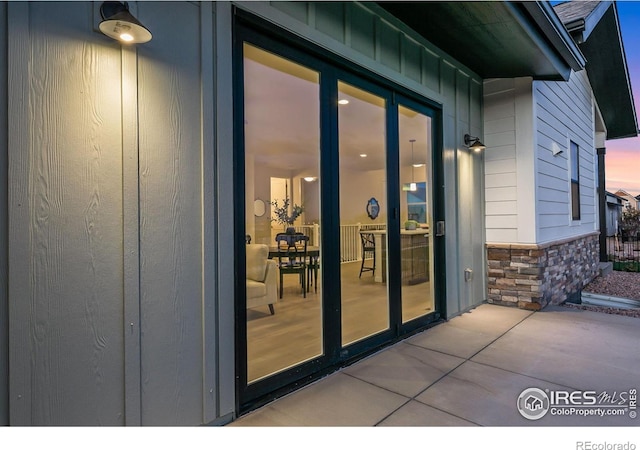 3425 Green Lake Dr, Fort Collins, CO 80524 - entrance to property with stone siding and board and batten siding