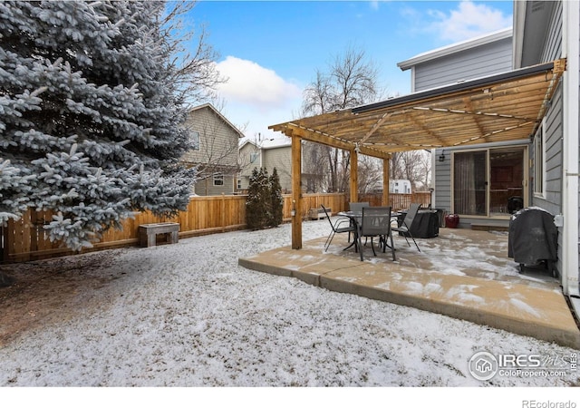 view of patio with a pergola and a grill