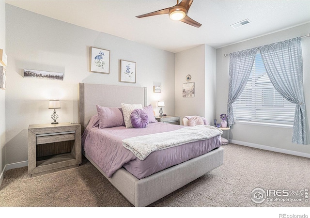 carpeted bedroom with ceiling fan