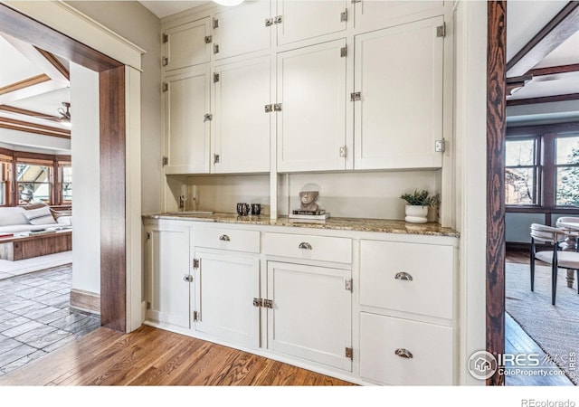 851 14th St, Boulder, CO 80302 - bar featuring baseboards, a wealth of natural light, and light wood-style floors