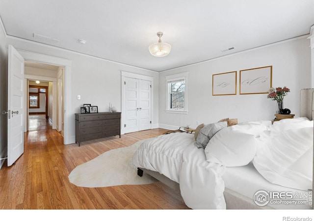 851 14th St, Boulder, CO 80302 - bedroom featuring baseboards, visible vents, light wood-style flooring, and a closet