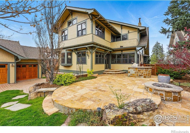 851 14th St, Boulder, CO 80302 - back of property featuring a balcony, an outdoor fire pit, and a patio area
