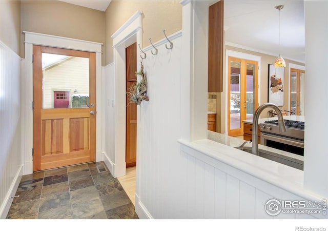 interior space with crown molding and plenty of natural light