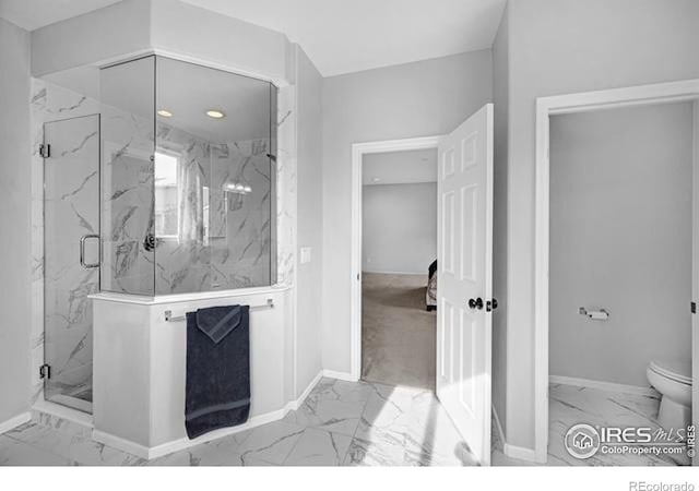 887 Sundance Ln, Erie, CO 80516 - bathroom with marble look tiles and a marble finish shower