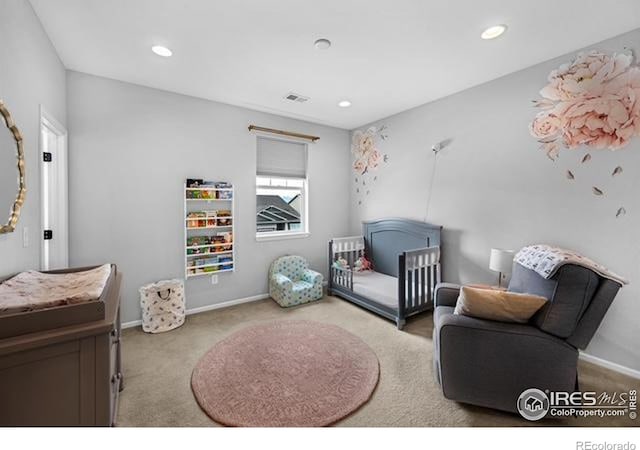 887 Sundance Ln, Erie, CO 80516 - bedroom with carpet floors, recessed lighting, and a crib