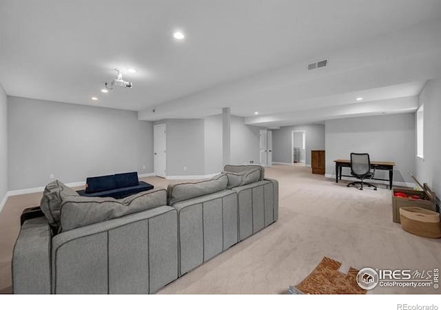 887 Sundance Ln, Erie, CO 80516 - living area featuring recessed lighting, light carpet, and a desk