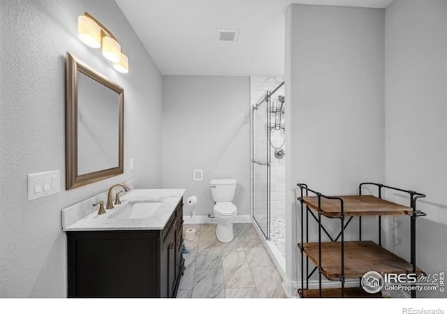 887 Sundance Ln, Erie, CO 80516 - bathroom with marble look tiles, vanity, and a shower stall