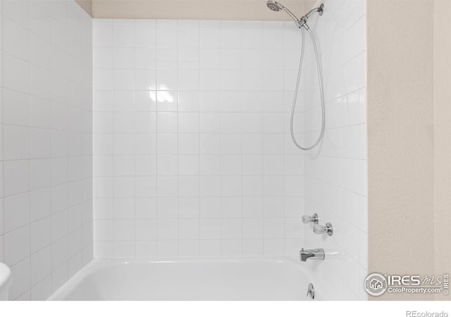 bathroom with shower / bath combination