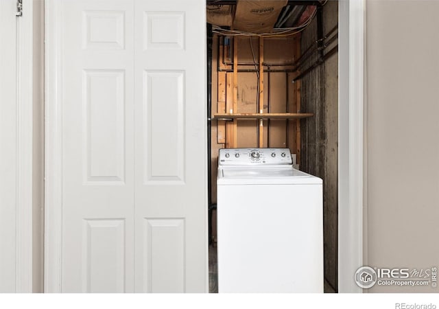 washroom featuring washer / dryer and laundry area