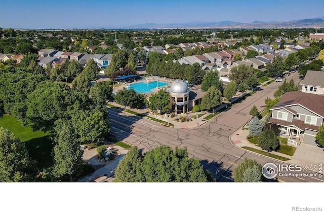 birds eye view of property with a residential view and a mountain view