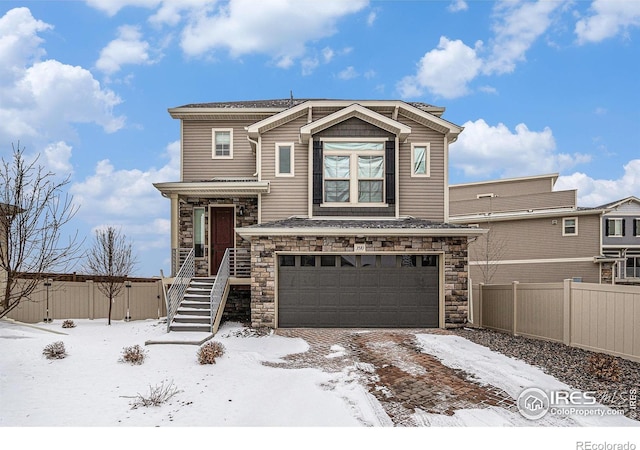 view of front of property featuring a garage