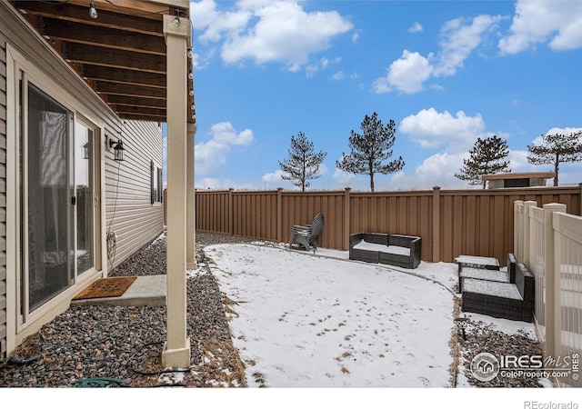 3510 Valleywood Ct, Johnstown, CO 80534 - yard covered in snow featuring fence and a patio area