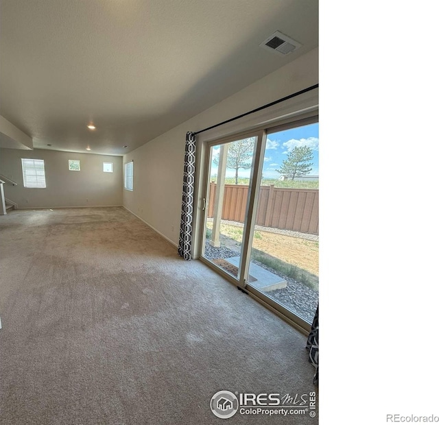 3510 Valleywood Ct, Johnstown, CO 80534 - unfurnished living room featuring carpet flooring and recessed lighting
