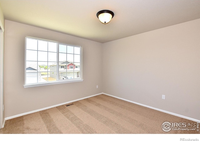 view of carpeted empty room