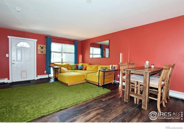 living room featuring a baseboard radiator and dark hardwood / wood-style floors