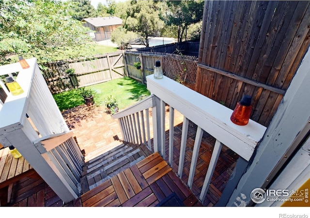 wooden terrace featuring a patio