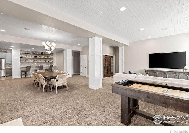 living room featuring light carpet and wooden ceiling