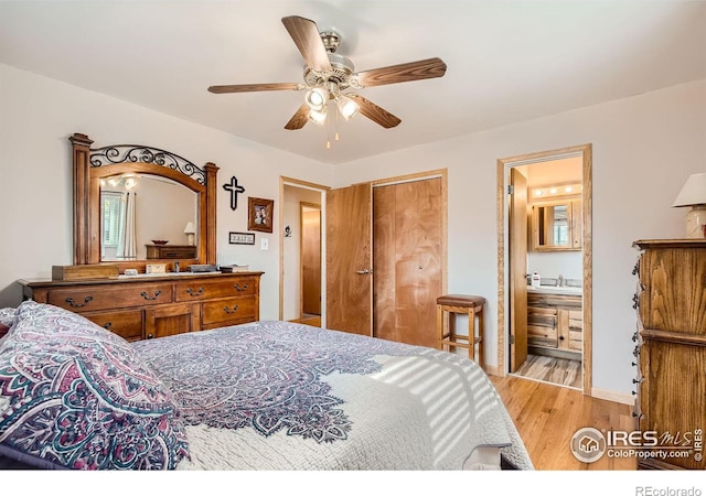 bedroom with ceiling fan, a closet, ensuite bathroom, and light hardwood / wood-style floors