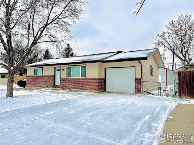 single story home featuring a garage