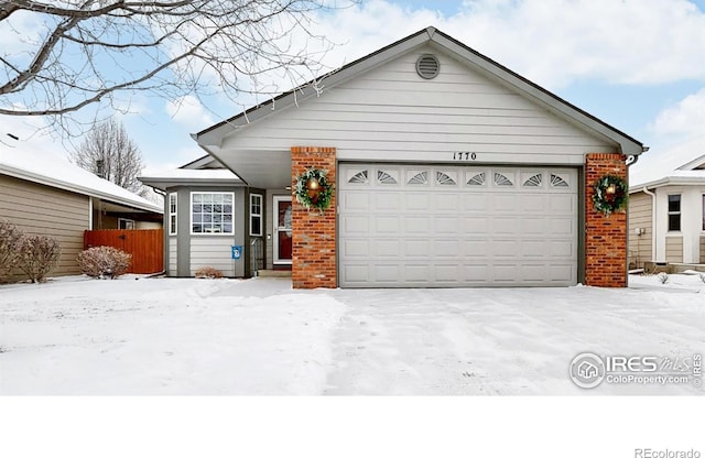 ranch-style home with a garage