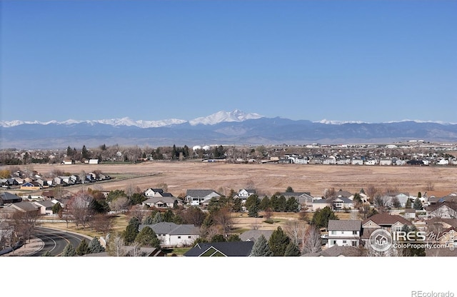 property view of mountains with a residential view