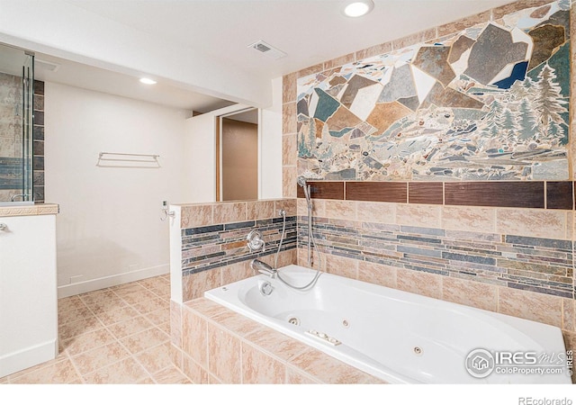 bathroom featuring a tub with jets, visible vents, tile patterned flooring, and recessed lighting