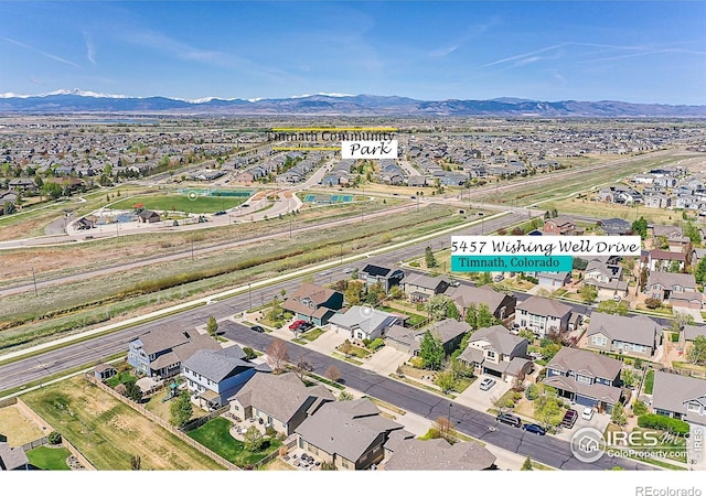 bird's eye view featuring a mountain view and a residential view
