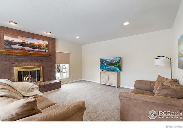 living room featuring light carpet, recessed lighting, a fireplace, and baseboards