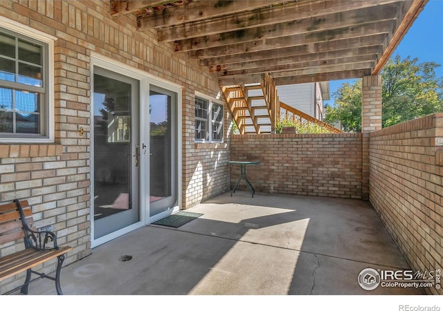 view of patio / terrace with fence