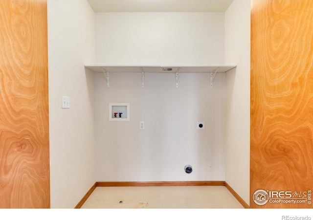 laundry room featuring light floors, baseboards, washer hookup, and hookup for an electric dryer