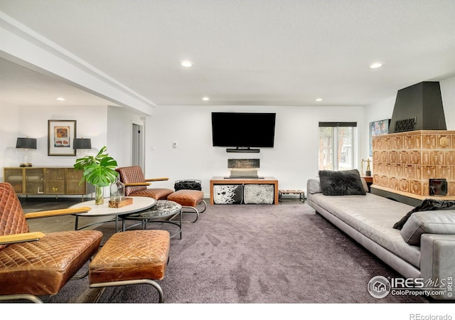 carpeted living room featuring recessed lighting