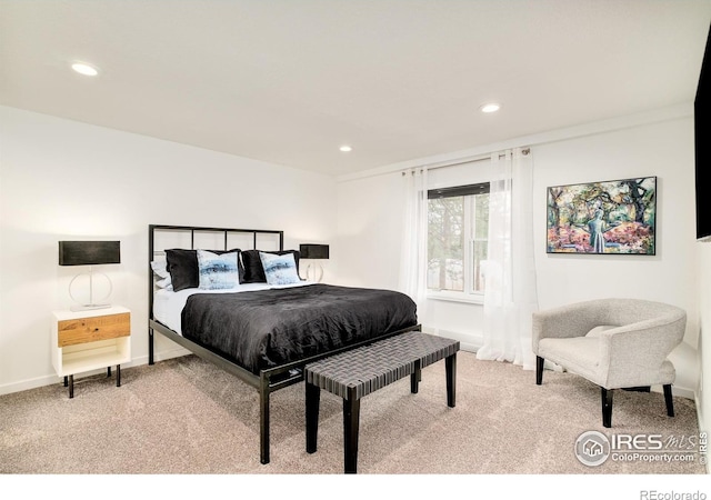 carpeted bedroom with baseboards and recessed lighting