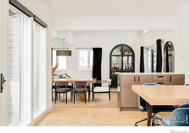dining area with light wood-type flooring