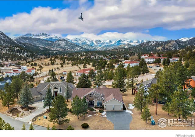 aerial view with a residential view and a mountain view