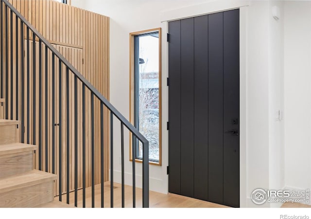foyer entrance featuring stairway