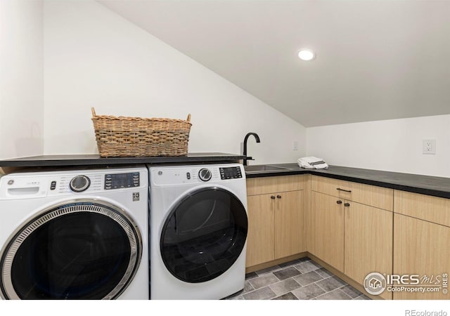 laundry area with washer and dryer, recessed lighting, cabinet space, and a sink