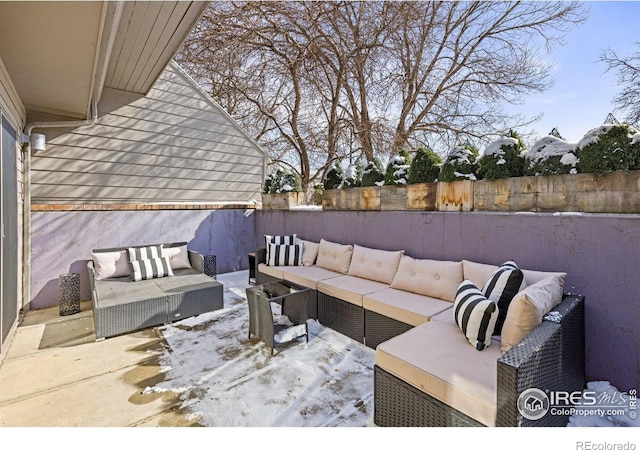 view of patio / terrace with a fenced backyard and an outdoor living space