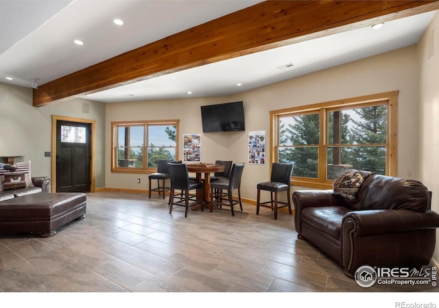 living room featuring baseboards, visible vents, beam ceiling, and recessed lighting