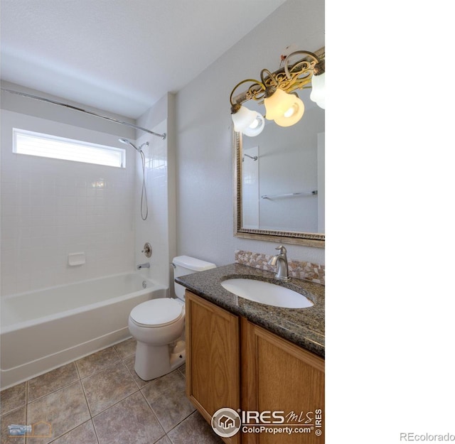 full bathroom featuring shower / bath combination, vanity, toilet, and tile patterned floors