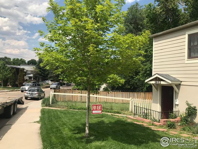 view of yard featuring fence