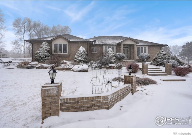 view of front of property with brick siding