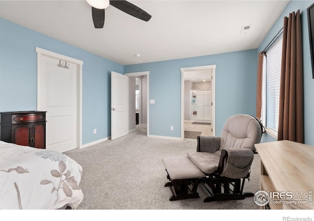 bedroom featuring baseboards, ceiling fan, visible vents, and light colored carpet