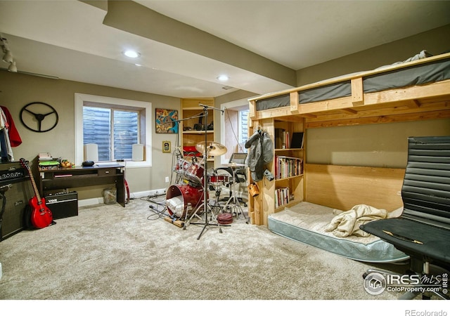 bedroom with carpet, multiple windows, baseboards, and recessed lighting