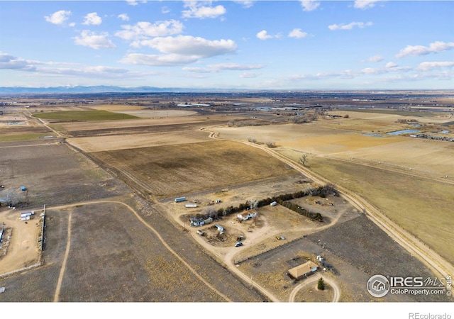 birds eye view of property featuring a rural view