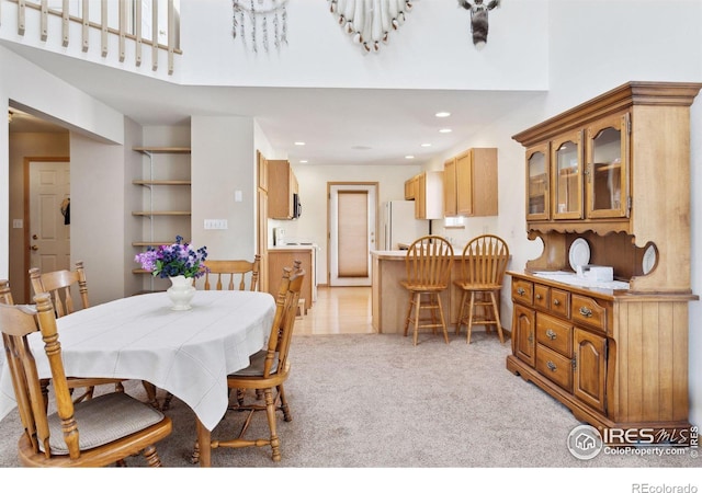2143 Meadow Ct, Longmont, CO 80501 - dining room with light carpet and recessed lighting